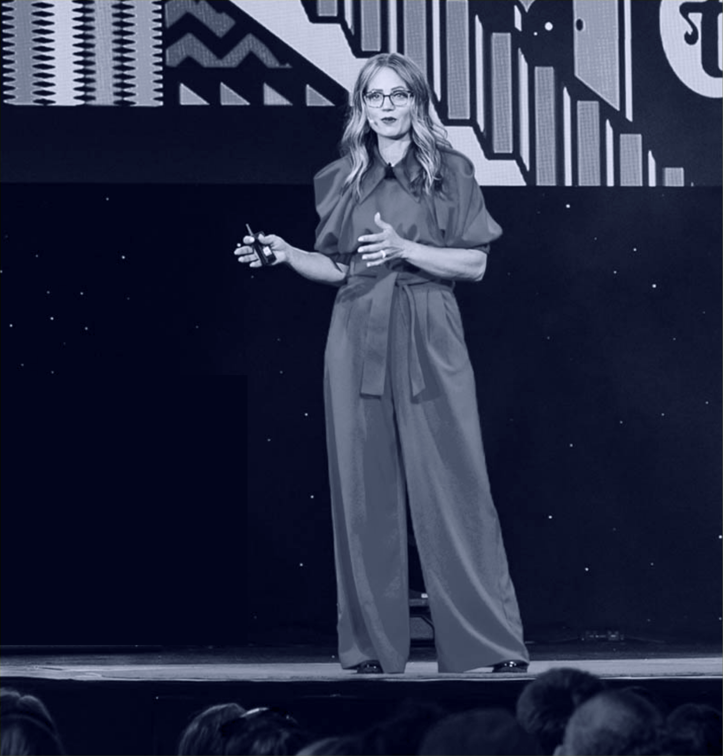 Amanda Schneider delivers a TEDx Talk onstage. Amanda Schneider delivers a TEDx Talk onstage.